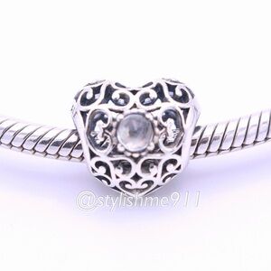 Authentic PANDORA April Signature Heart Charm - Rock Crystal